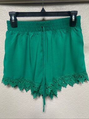 Sale 2/$10* Kelly green shorts with crocheted hem. Size S / Ambiance apparel.